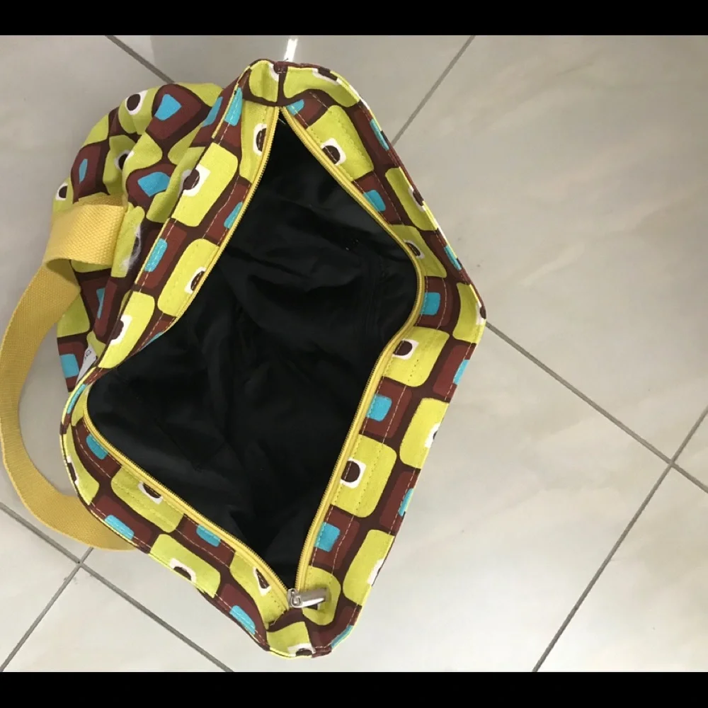 EcoTotes Colorful Tote With Yellow Straps and Zippered Closure